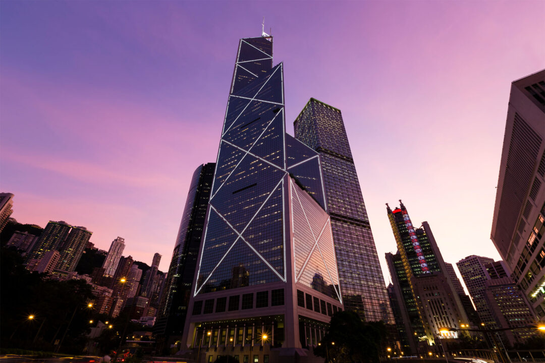 The Bank of China Tower at sunset in Central, symbolizing the professional growth and opportunities within the Hong Kong Talent Scheme.